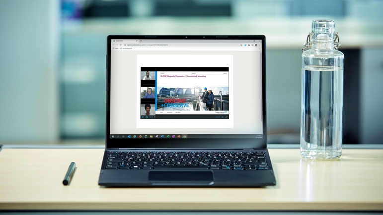 Laptop presenting running online seminar of Endress+Hauser
